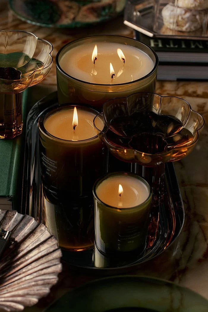 Detail view of the three cotton wicks and Flamingo Estate label on the Night Blooming Jasmine and Damask Rose XL Candle