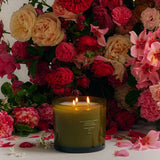 Side profile of the XL three-wick Jasmine Damask Rose candle showing the scale of the hand-blown glass vessel
