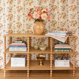 Calimia Home three tier natural oak console table with hand-turned bobbin posts and decorative shelf styling