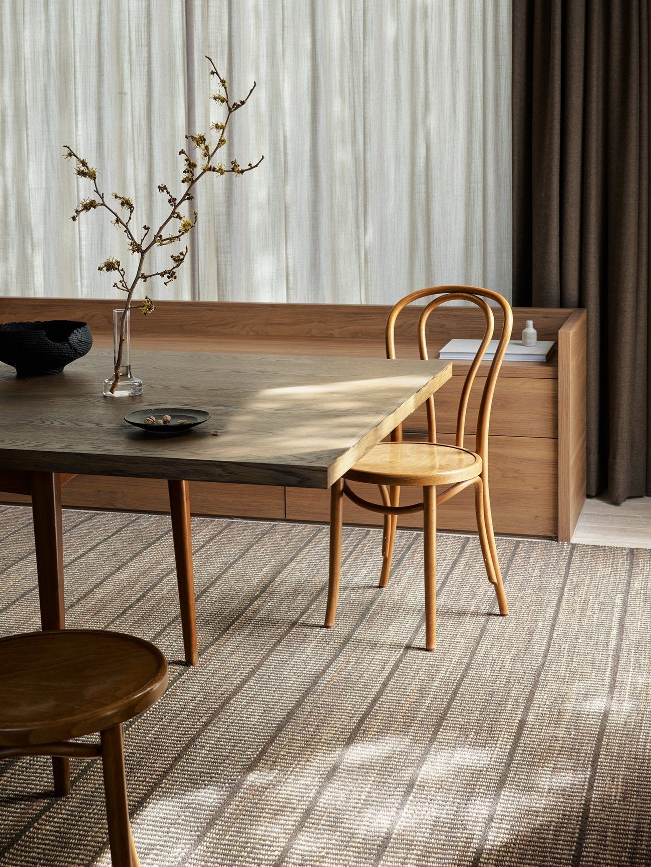 Armadillo Trellis Rug in Natural & Bison, handwoven wool and jute rug shown in a room setting