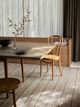 Armadillo Trellis Rug in Natural & Bison, handwoven wool and jute rug shown in a room setting