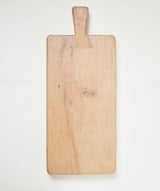 Detail of hand-finished joinery on a reclaimed oak cutting board