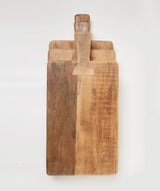 Italian reclaimed oak cutting board, small, styled on a counter