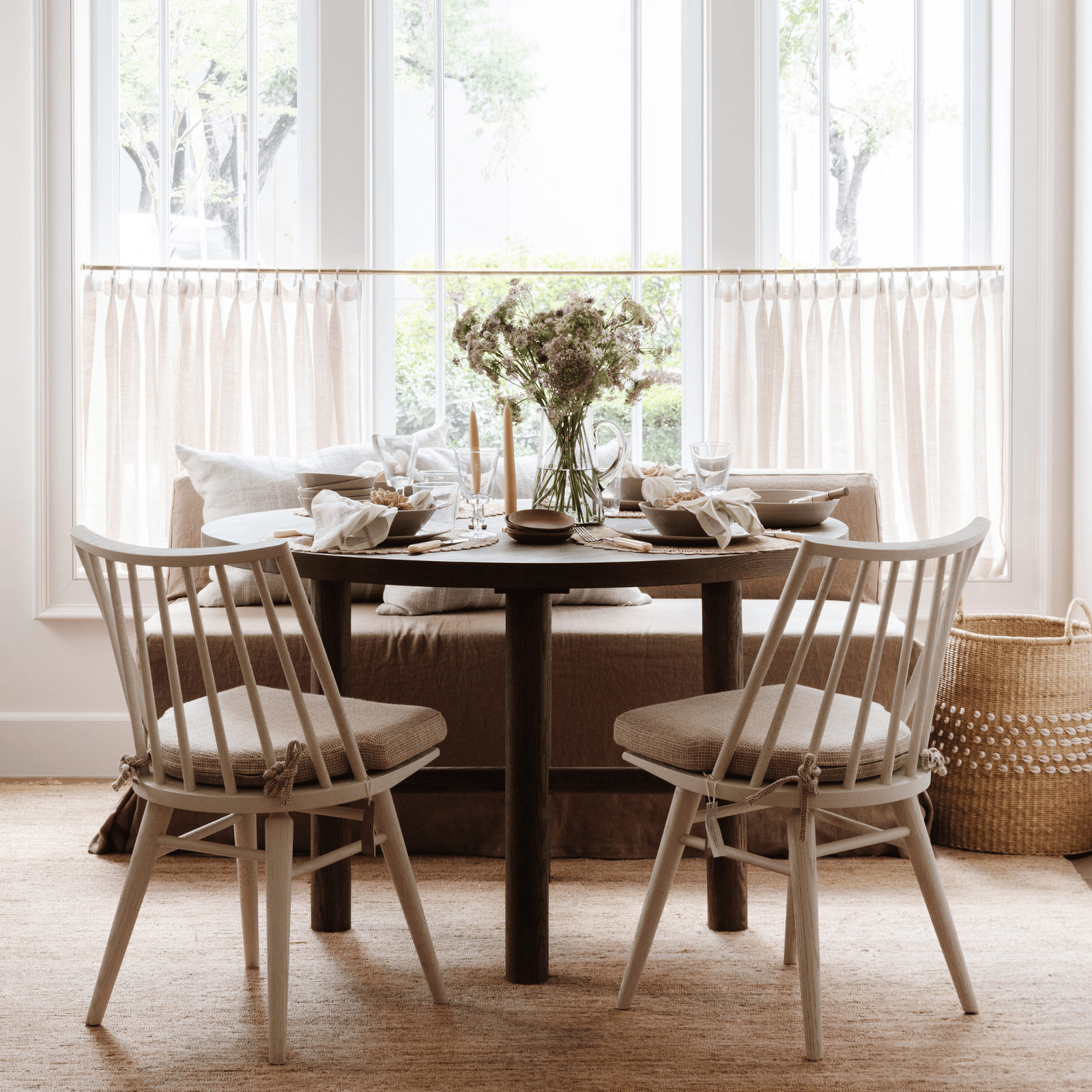 Valencia X Dining Table with bold circle legs in natural oak