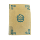 Calimia Home vintage Fortaellinger book by Herman Bang with yellow cloth cover and green floral corner detailing