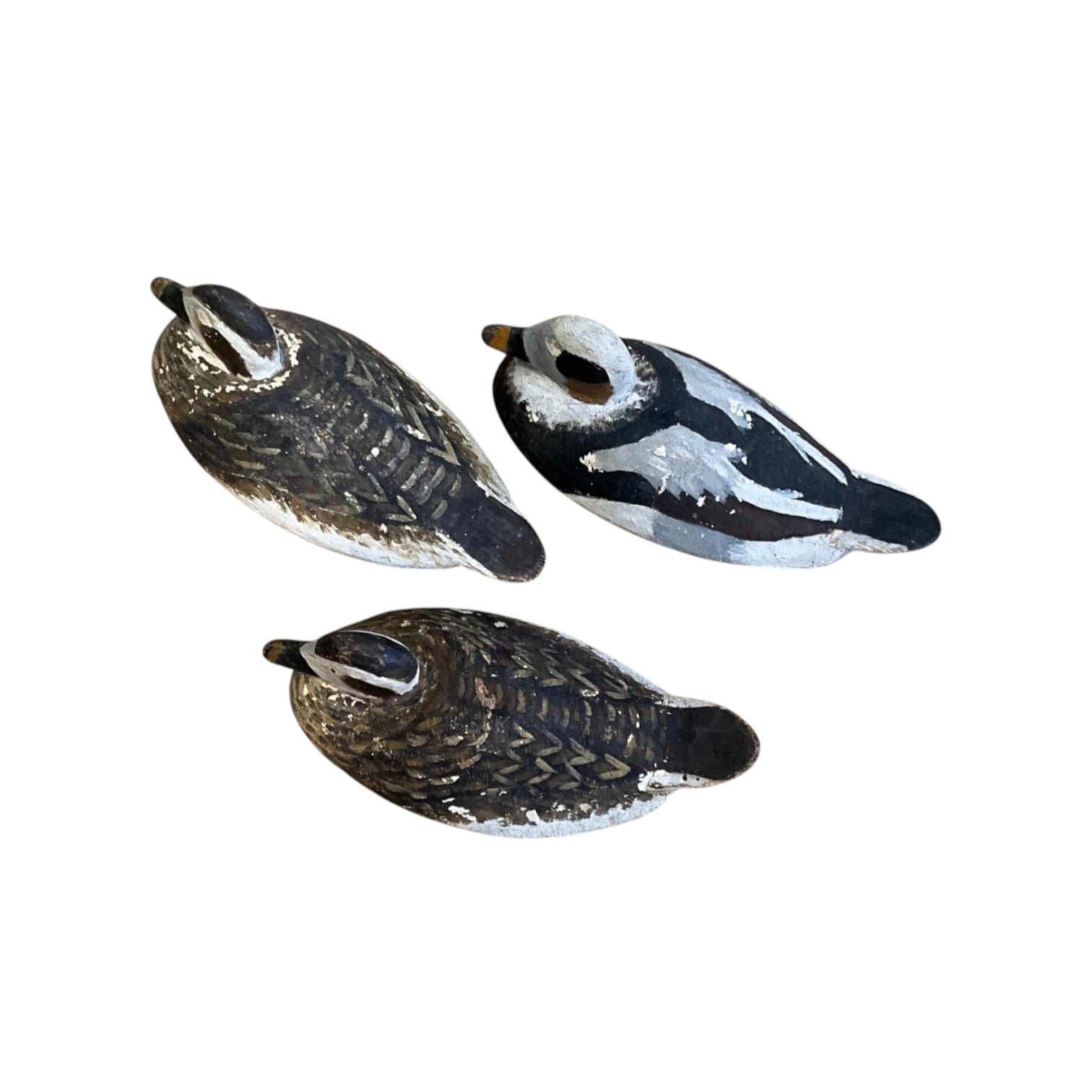 Vintage carved wood decoy ducks — hand-painted
