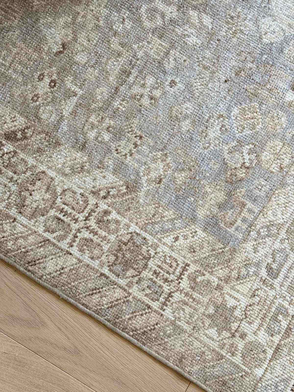 Vintage rug 7'1 x 9'6 — full view showing pattern and palette