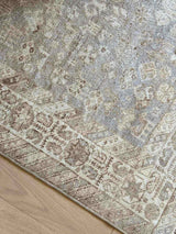 Vintage rug 7'1 x 9'6 — full view showing pattern and palette