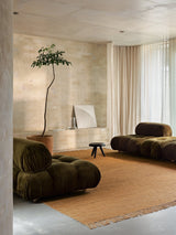 Armadillo Willow Rug in Mustard, handwoven flatweave rug shown in a room setting