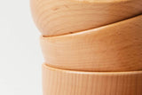 Close-up of Farmhouse Pottery wooden utility bowl, natural wood grain