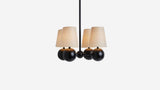 Workstead Bole Pendant IV with Natural Linen shade, illuminated