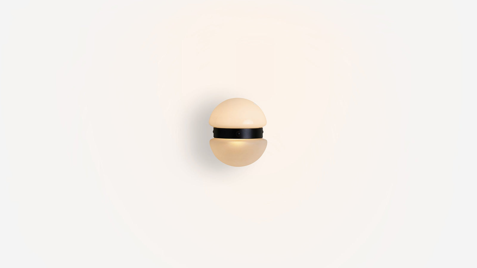 Workstead Buoy Hemisphere Sconce, illuminated