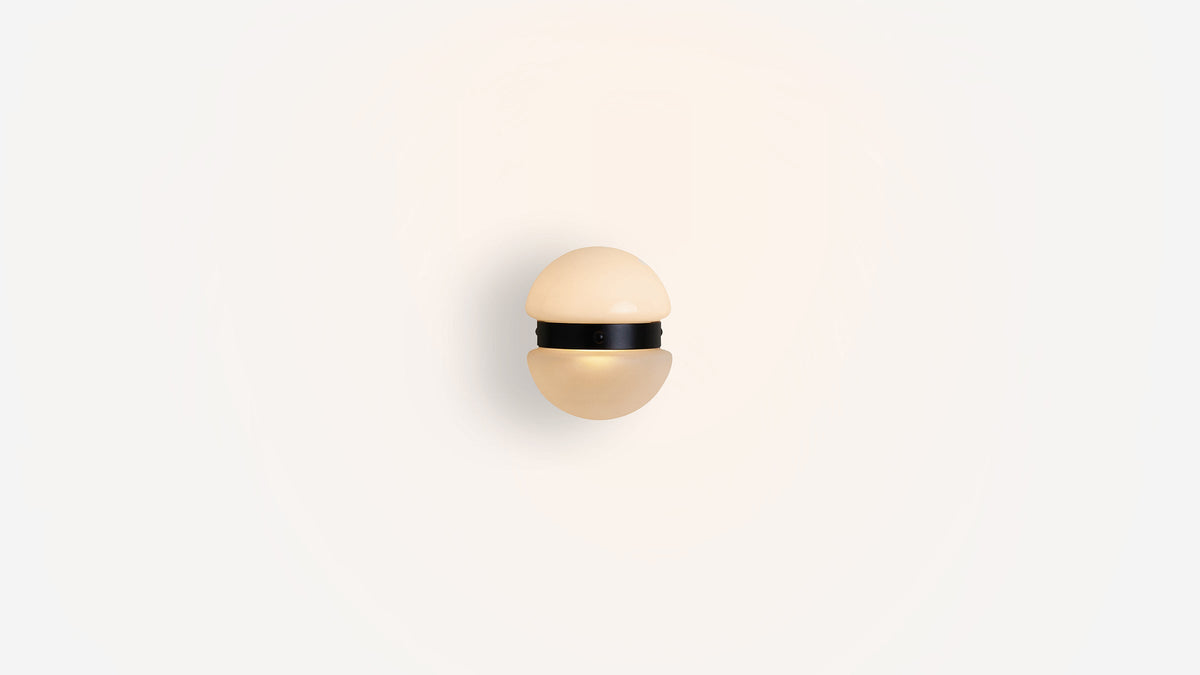 Workstead Buoy Hemisphere Sconce, illuminated