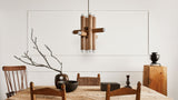 Workstead Hieroglyph Pendant XII installed over a dining table