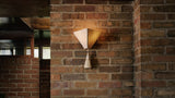 Workstead Lantern Pyramid Sconce in a room setting