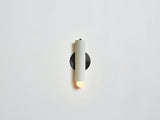 Workstead Lodge Sconce in Painted White with Blackened Brass hardware, illuminated