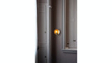 Workstead Orbit ADA Sconce in a room setting