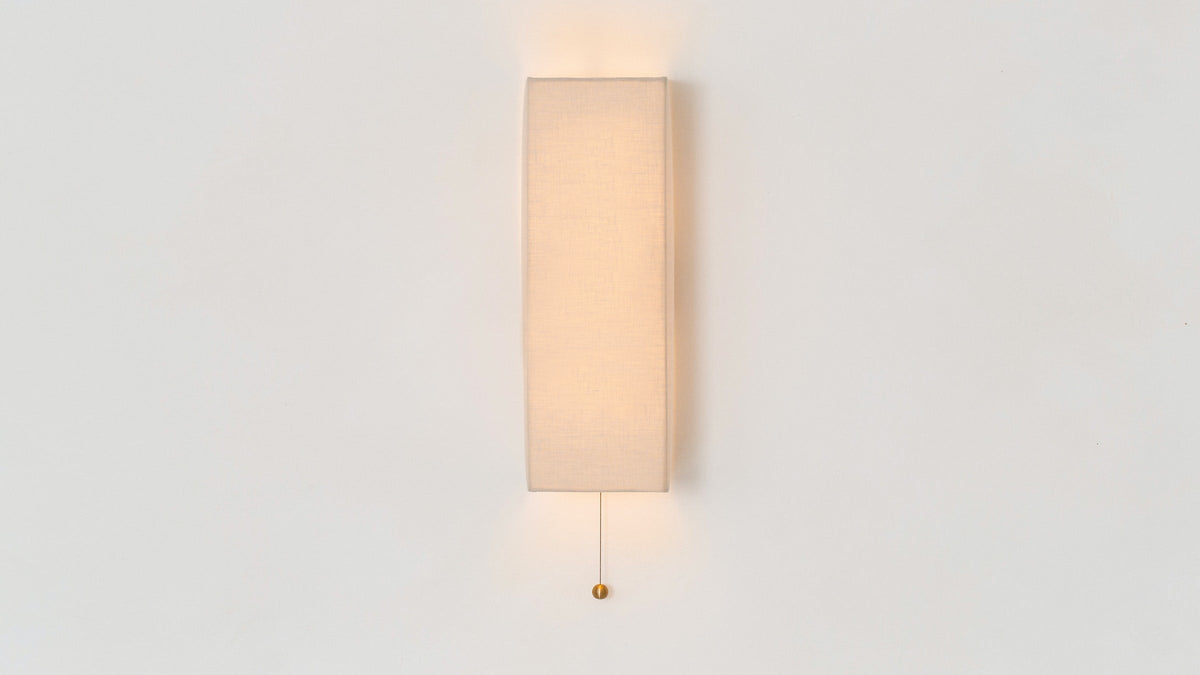 Workstead Shaded Block Sconce, illuminated