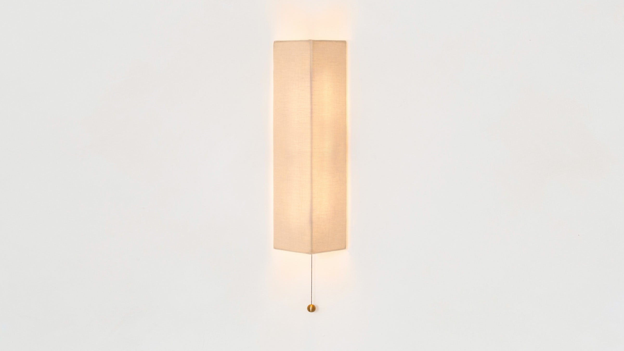 Workstead Shaded Gable Sconce, illuminated