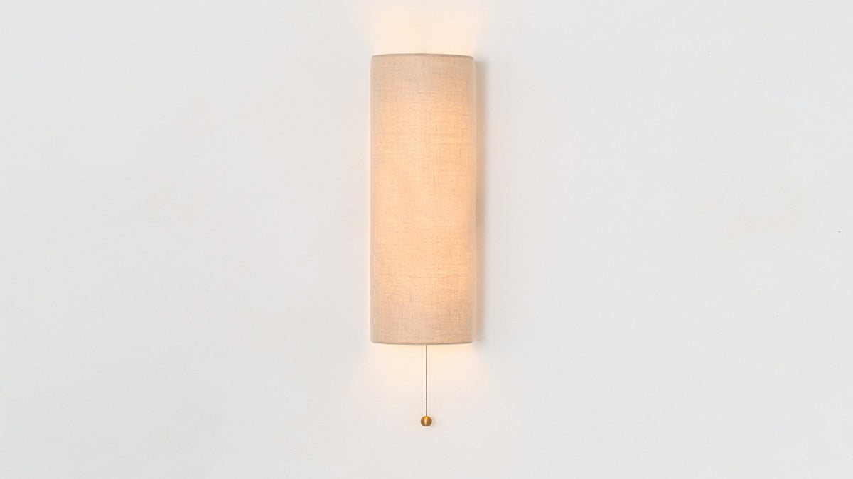 Workstead Shaded Vault Sconce, illuminated