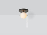Workstead Signal Pendant Flush Mount in Hand Finished Bronze, illuminated