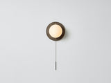 Workstead Signal Sconce in Hand Finished Bronze, illuminated
