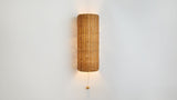 Workstead Woven Vault Sconce illuminated on wall