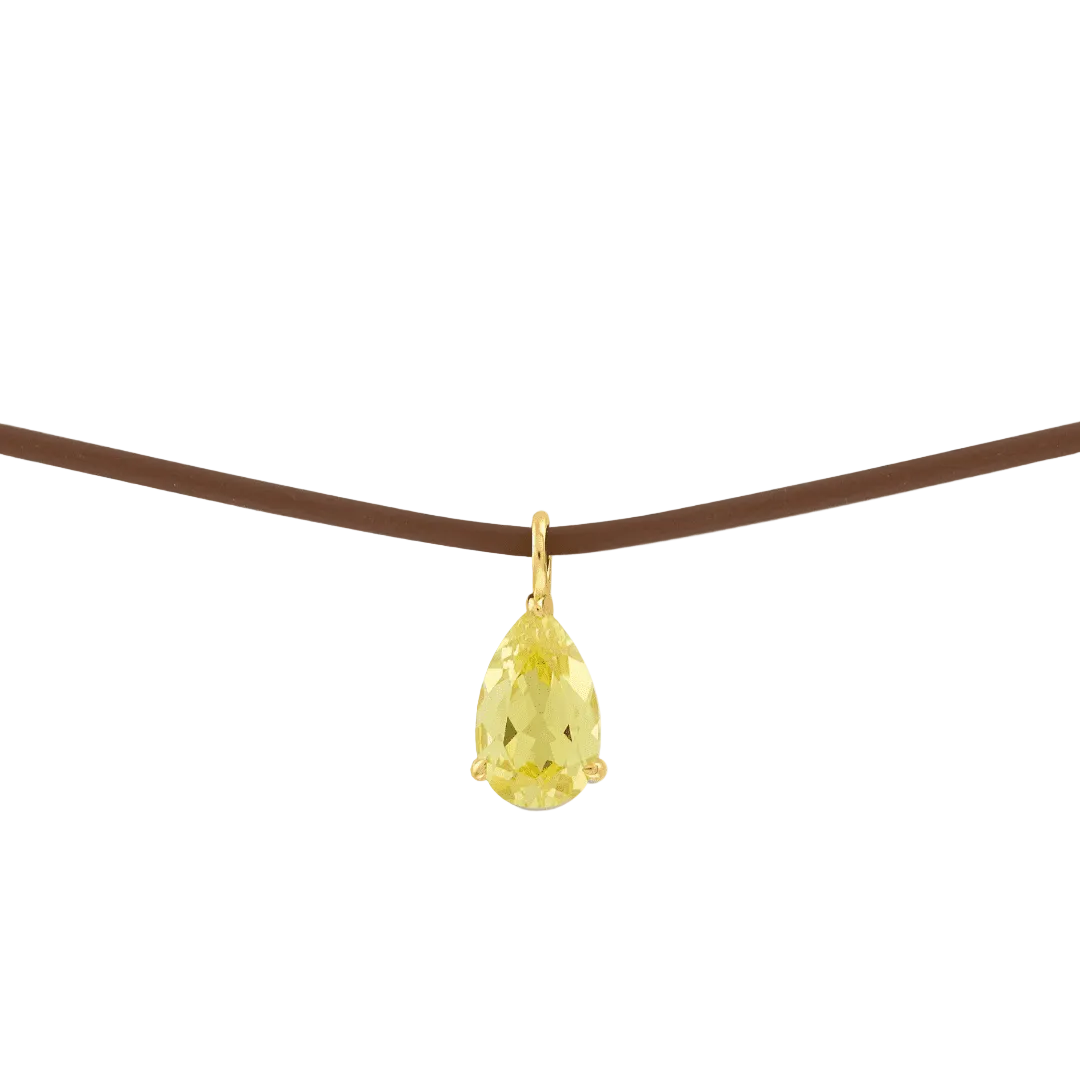 Yellow pear-cut pendant with brown rubber cord necklace